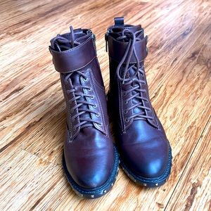 Vince Camuto brown lace up ankle bootie.